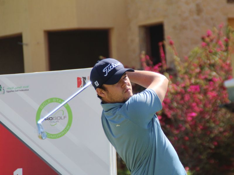 Kristof Ulenaers hitting a professional golf shot during tournament play